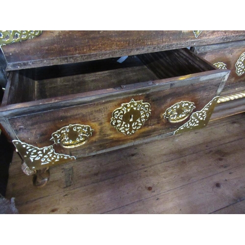 72 - An 18th century Dutch colonial mule chest with plain raising lid and brass studded and pierced mount... 