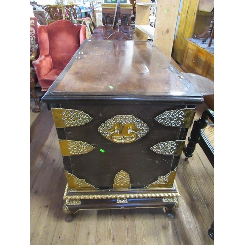 72 - An 18th century Dutch colonial mule chest with plain raising lid and brass studded and pierced mount... 