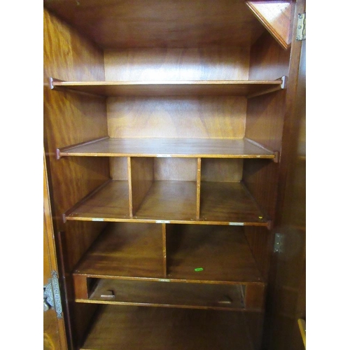 90 - A walnut gentleman's wardrobe, width 39ins, height 75ins