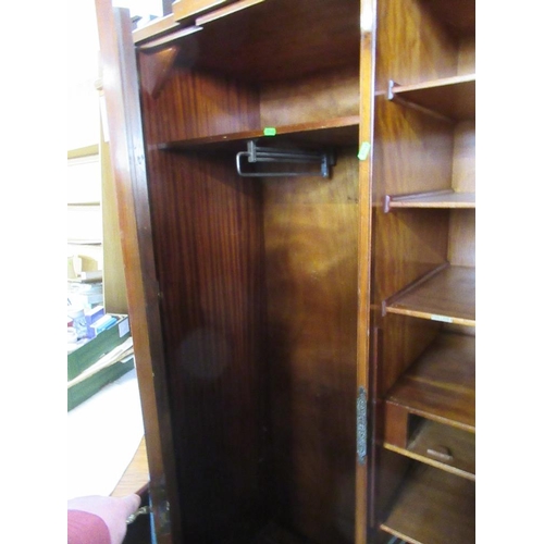 90 - A walnut gentleman's wardrobe, width 39ins, height 75ins