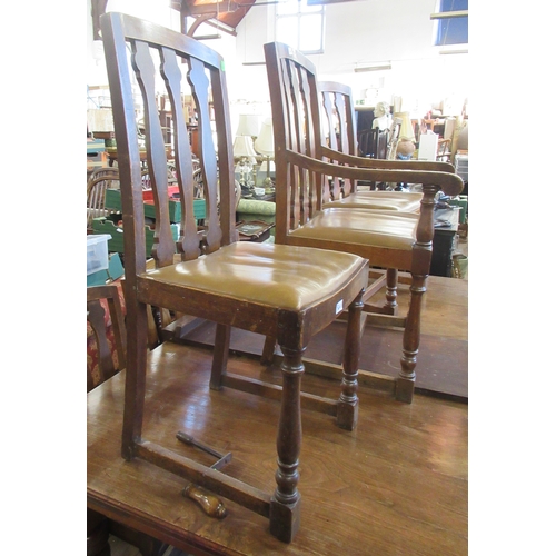 34A - A set of 10 (8+2) early 20th century oak dining chairs having three shaped splats to the back