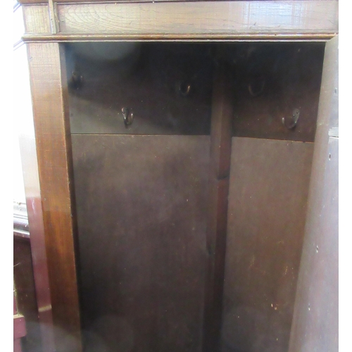 10 - An antique floor standing corner cupboard, width 36ins, height 67ins