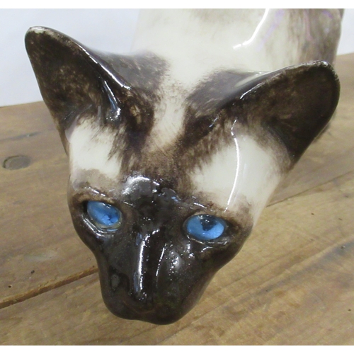 140 - A Winstanley model, of a crouching cat