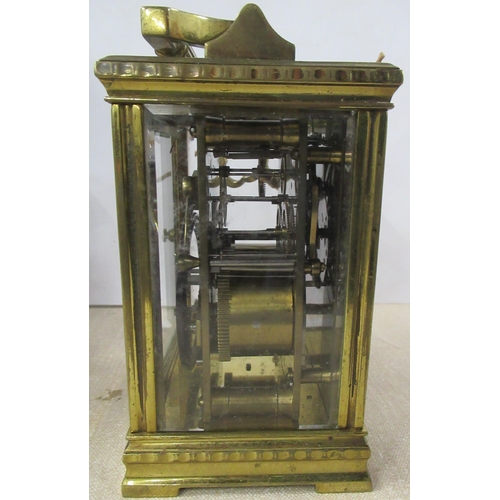 144 - A brass cased repeating carriage clock, with enamel dial and Roman numerals