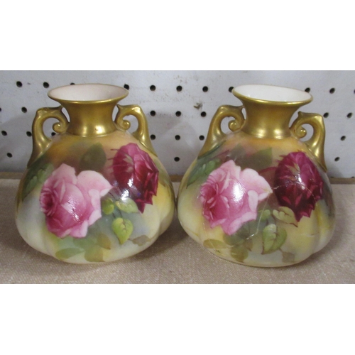 150 - A pair of Royal Worcester vases, decorated with roses, af, together with two Royal Worcester monk ca... 