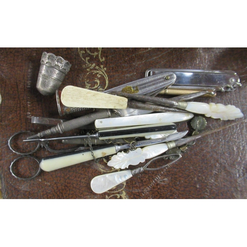 203 - 12 various silver mounted and glass dressing table bottles and jars, together with thimbles, scissor... 