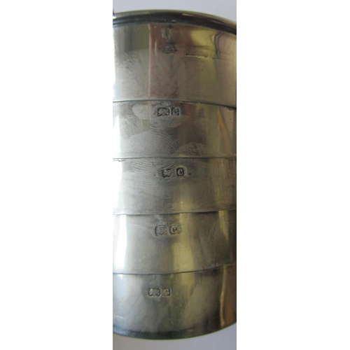 209 - A silver collapsible beaker, together with circular silver box, engraved with a crest, weight 5oz