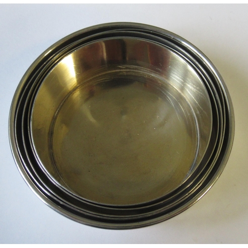 209 - A silver collapsible beaker, together with circular silver box, engraved with a crest, weight 5oz