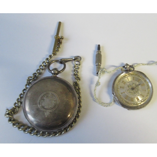 265 - A silver hunter pocket watch, with chain, together with a ladies silver cased open face pocket watch