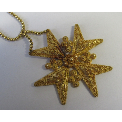 271 - A 15ct gold necklace, suspended with three filigree Maltese style crosses, weight 13.8g