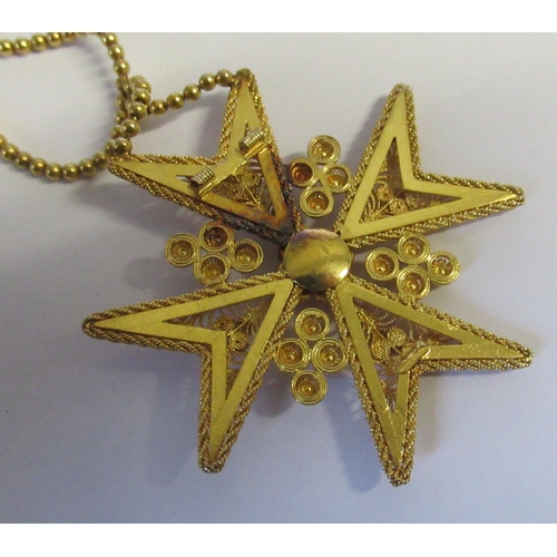 271 - A 15ct gold necklace, suspended with three filigree Maltese style crosses, weight 13.8g