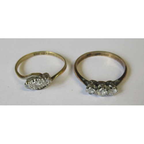 292 - A three stone diamond ring, set three old cut diamonds, estimated total weight 0.25ct, and another t... 