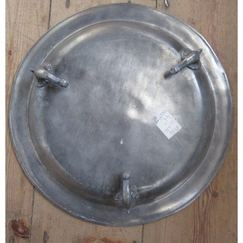 329 - A pewter bowl, diameter 8ins, together with a polished pewter dish on three legs, diameter 13.5ins