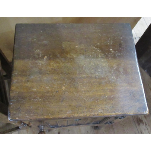 37 - A 20th century oak cabinet, fitted with a pair of cupboard doors, with carved decoration, 36ins x 16... 