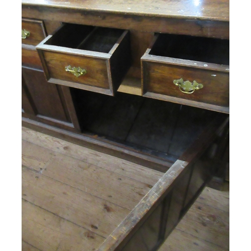 39 - An Antique oak sideboard, fitted with drawers and cupboards, width 56ins, depth 22ins, height 32ins