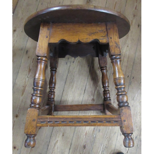 50 - A pair of 20th century oak circular tables, diameter 20.5ins, height 20.5ins