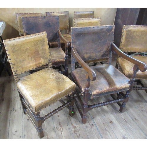 59 - A set of eight (6+2) oak and leather upholstered dining chairs, with turned front lower rail