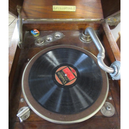 66 - A Fullotone gramphone, in oak case, together with records