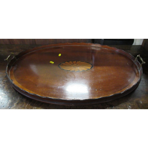 371 - An oval gallery tray, with inlaid decoration, diameter 27ins