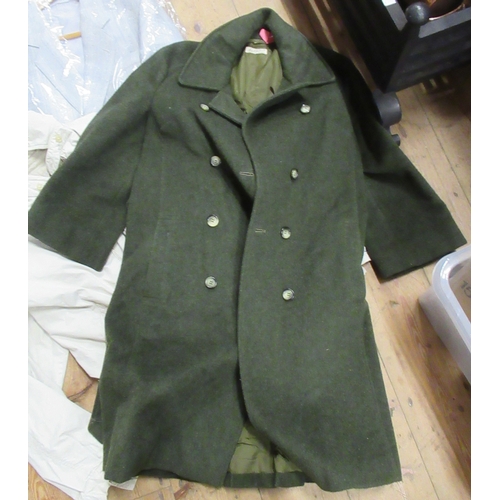 392 - A collection of clothing, to include suit, green long coat, jacket etc