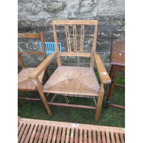 98 - A collection of furniture to include chairs, Arts and Crafts style armchair, table etc