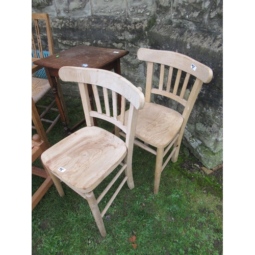 98 - A collection of furniture to include chairs, Arts and Crafts style armchair, table etc