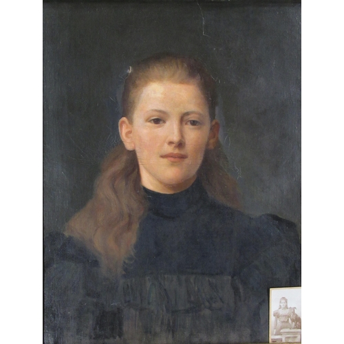 128 - A 19th century oil on canvas, portrait of a girl wearing black, 21ins x 16ins, together with a black... 