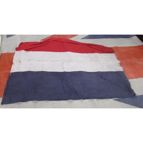 151 - A collection of vintage flags, to include Union Jacks, the largest example 62ins x 112ins