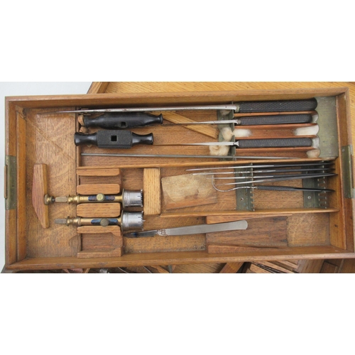 162 - An Early 20th Century/ World War Field Surgeon’s Set, in oak brass bound case, with interior tray an... 