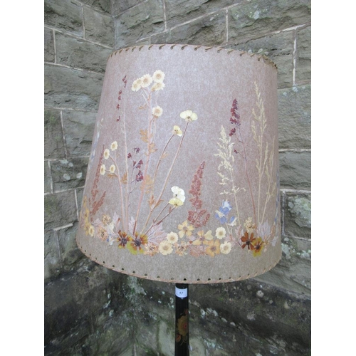 17 - A standard lamp , with chinoiserie lacquered decoration