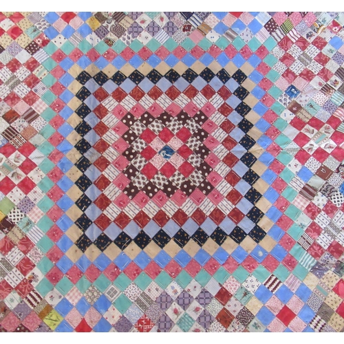 172 - An Antique hand stitched mosaic style patchwork quilt, with geometric patterns