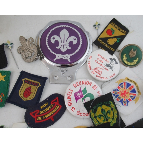 175 - A large collection of vintage Boy Scout embroidered badges, pennants, stick pins, hat badges etc