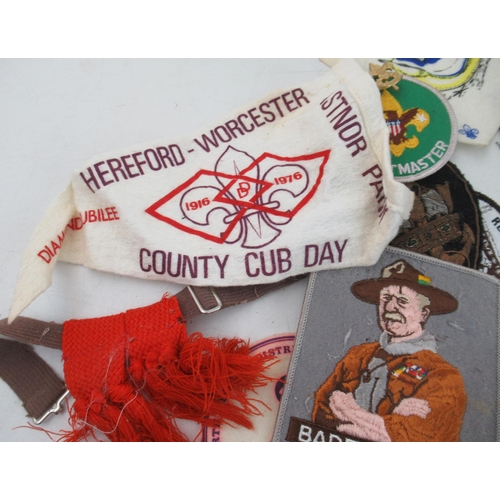 175 - A large collection of vintage Boy Scout embroidered badges, pennants, stick pins, hat badges etc