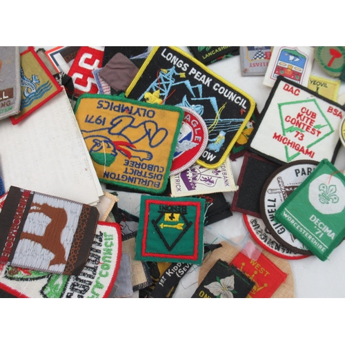 175 - A large collection of vintage Boy Scout embroidered badges, pennants, stick pins, hat badges etc