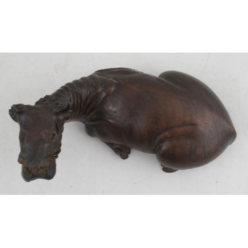 187 - A Chinese carved wooden model, of a water buffalo, width 8ins