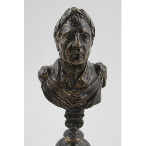 188 - An Antique bust, of neo classical figure, raised on a turned bronze pedestal, height 7.5ins