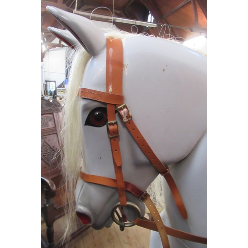 20 - A Carrington large dappled grey rocking horse, carved by Katherine M Stansfield width 70ins, height ... 