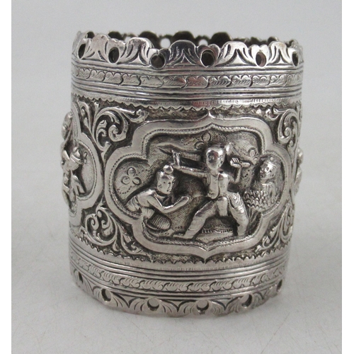 220 - A collection of Indian white metal, to include a cup and saucer, a vase, a dish, a shot cup and a na... 