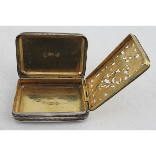 251 - A Georgian silver vinaigrette, with pierced and engraved gilt grill, together with a silver pill box... 