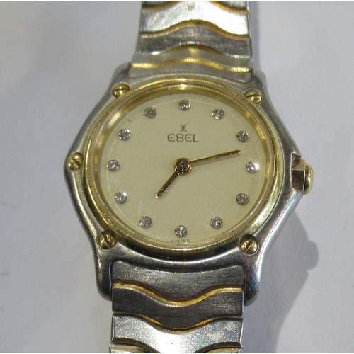 284 - A ladies Ebel stainless steel dress watch, the champagne dial set with twelve diamond markers, 10579... 