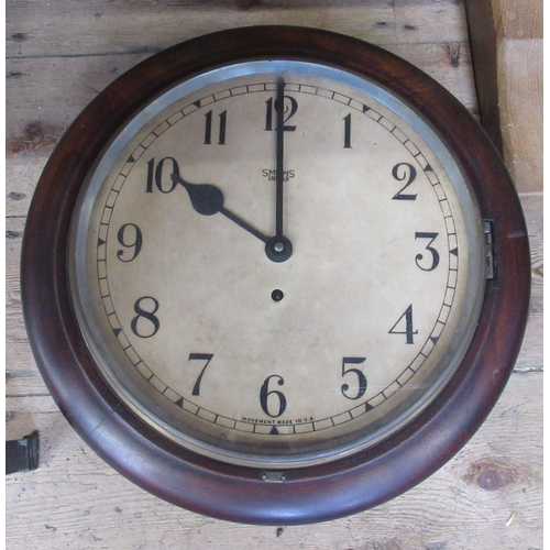 288 - A circular mahogany framed wall clock, by Smiths, together with a circular wall clock, with baromete... 