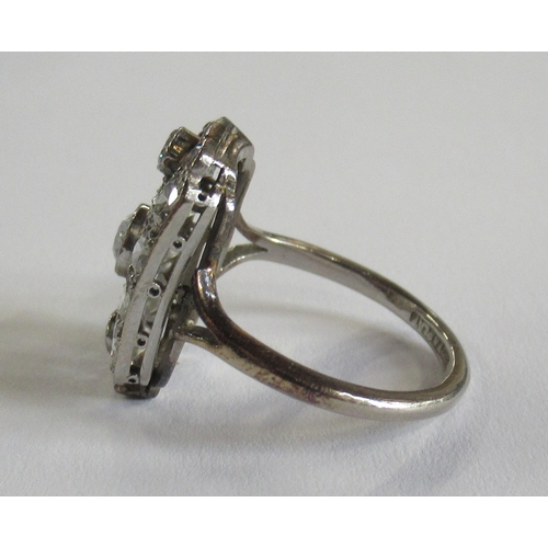 303 - An 18ct platinum geometric diamond ring, milligrain set old cut diamonds, total diamond weight est. ... 