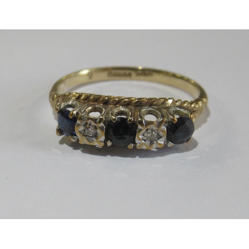 312 - A 9ct sapphire and diamond five stone ring, together with a dress ring set moonstone and cabochon bl... 