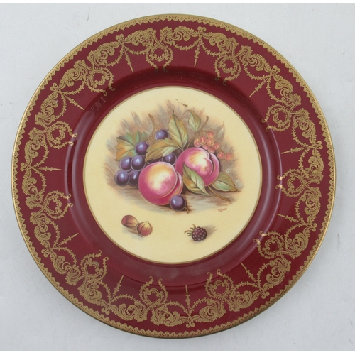 351 - An Aynsley plate, decorated with fruit to the centre, diameter 10.5ins