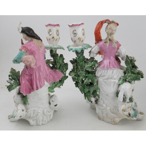 355 - A pair of 18th century Derby style figures, with sheep, and companion figure with floral candle stan... 