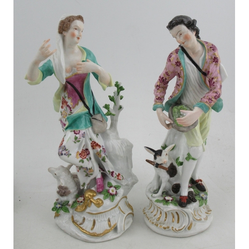 355 - A pair of 18th century Derby style figures, with sheep, and companion figure with floral candle stan... 