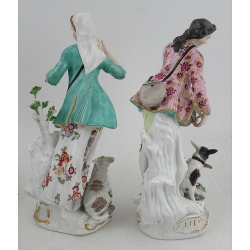 355 - A pair of 18th century Derby style figures, with sheep, and companion figure with floral candle stan... 