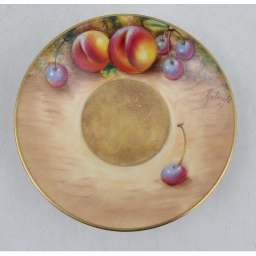 485 - A Royal Worcester coffee can and saucer, decorated with fruit by Roberts