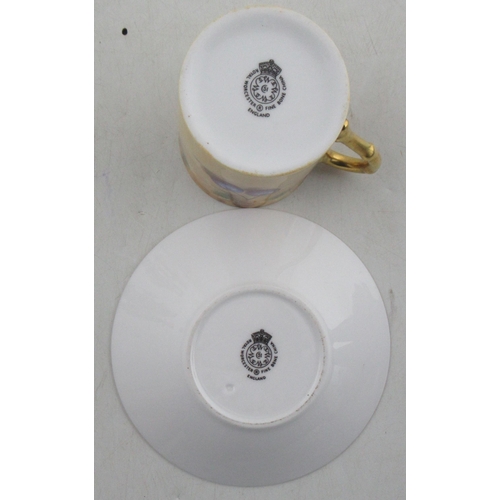 485 - A Royal Worcester coffee can and saucer, decorated with fruit by Roberts