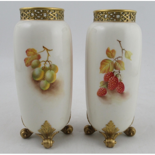 486 - A pair of Royal Worcester cylindrical shaped vases, painted half round with fruit by Townsend, with ... 